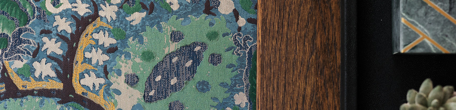 Tone Interiors portfolio hero — wallpaper, oak panelling, and marble detail composition